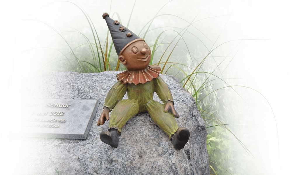 kindermonument natuurlijk zwerfkei clown brons