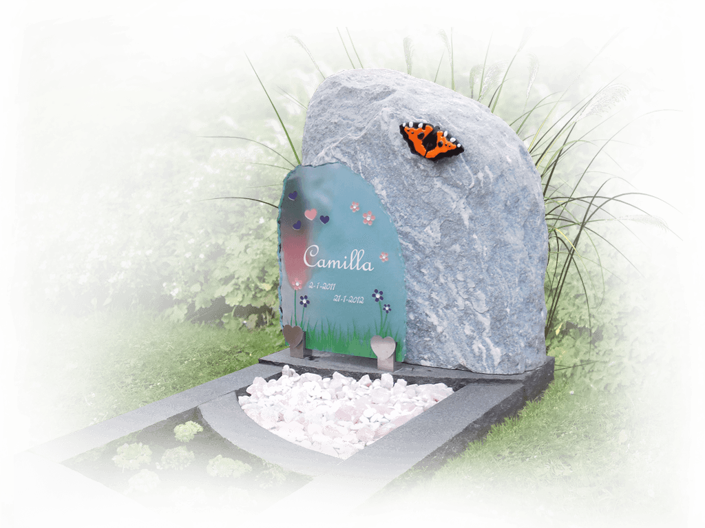 kindergraf monument symbolen betekenis vlinder op kei