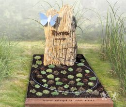 Kindermonument versteend hout