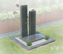 Kort grafmonument met zuilen