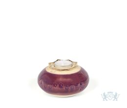 Ovale dierenurn van keramiek met kaarsenhouder rood/goud