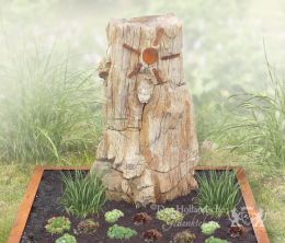 Versteend hout met cortenstaal grafmonument