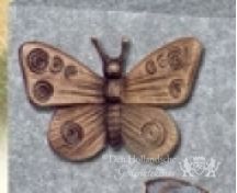 Bronzen vlinders op grafsteen foto 5