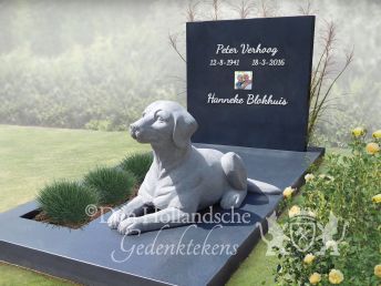 Familie grafsteen met beeld van een hond