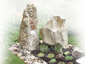 Gedenkteken met losse stenen en versteend hout