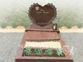 Grafmonument met hartje en gehakte rozen