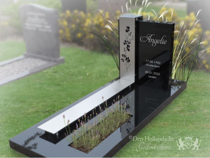 Grafmonument met RVS band en orchideeën foto 1