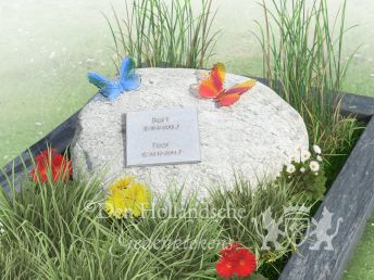 Kindermonument met zwerfkei en glazen vlinders