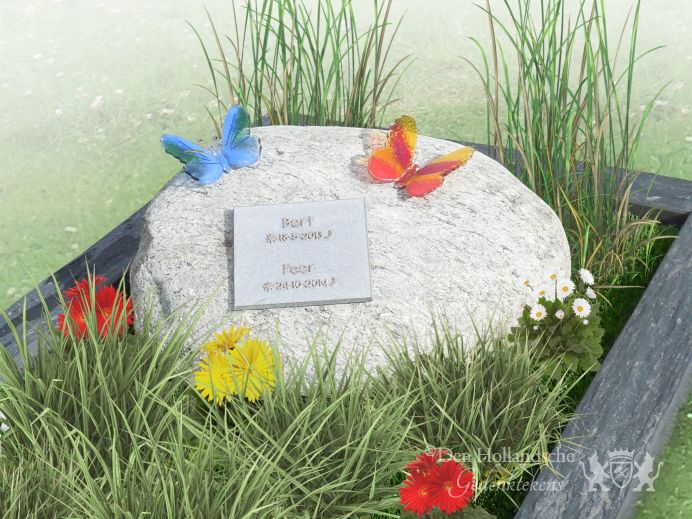 Kindermonument met zwerfkei en glazen vlinders foto 1