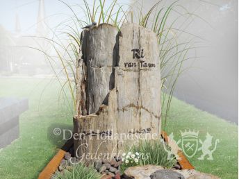 Natuurlijk grafmonument met bronzen accessoires