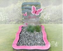 Speels grafmonument met roze vlinders foto 1