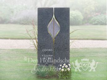 Urnmonument met bronzen blad