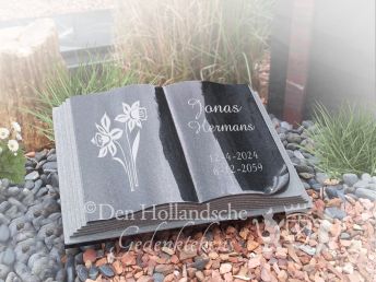 Urnmonument opengeslagen boek