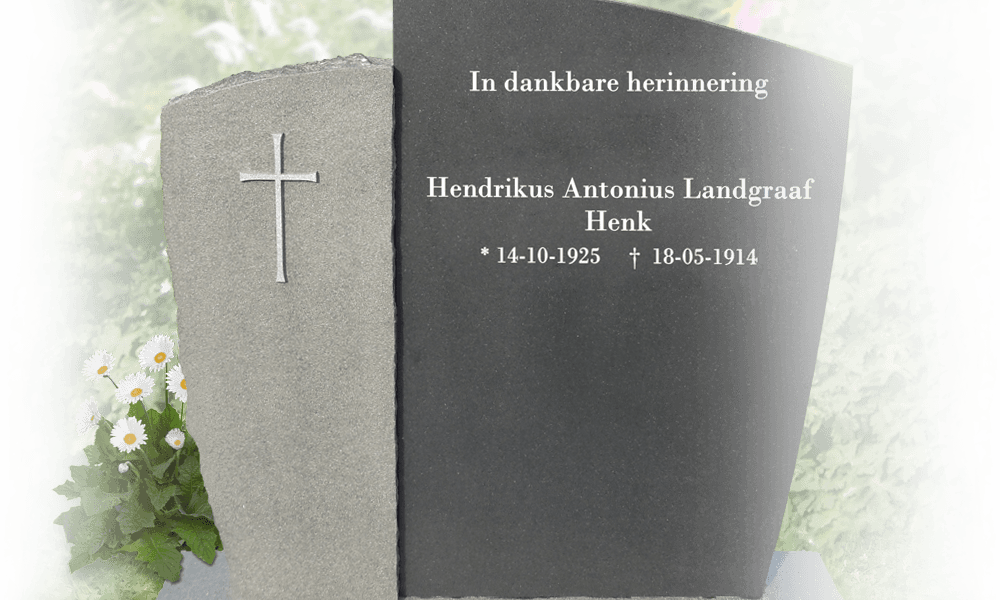 grafsteen met kruis op gedenkplaat