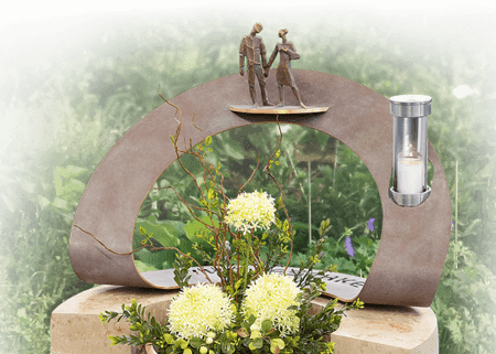 urnengraf in eigen tuin bronzen decoratie