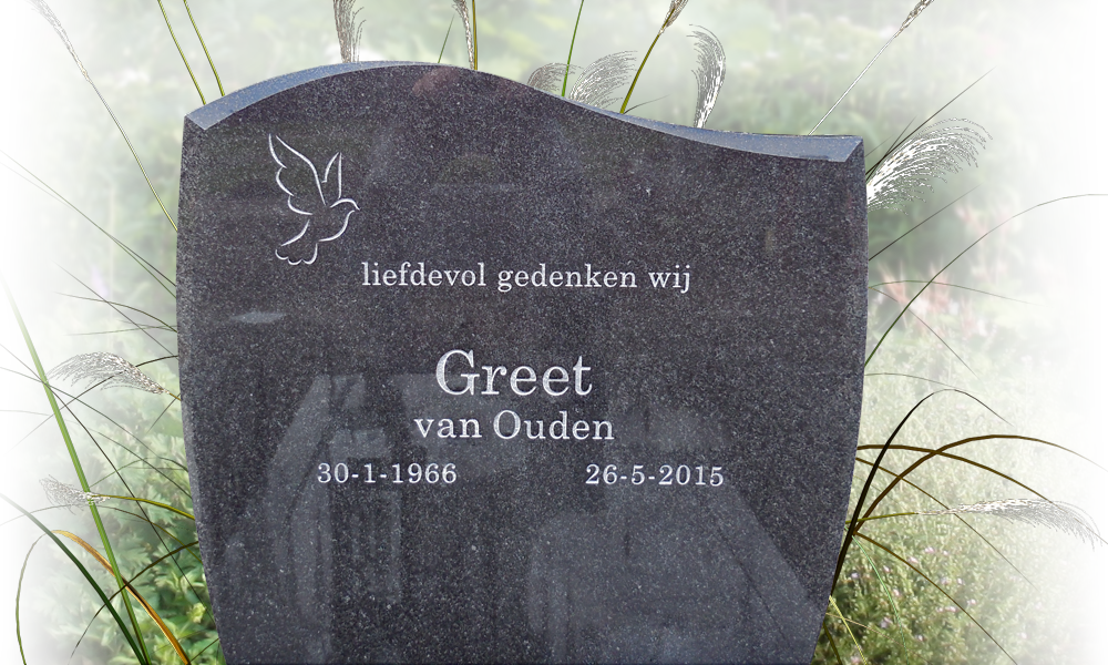 grafsteen decoraties duif op lettersteen